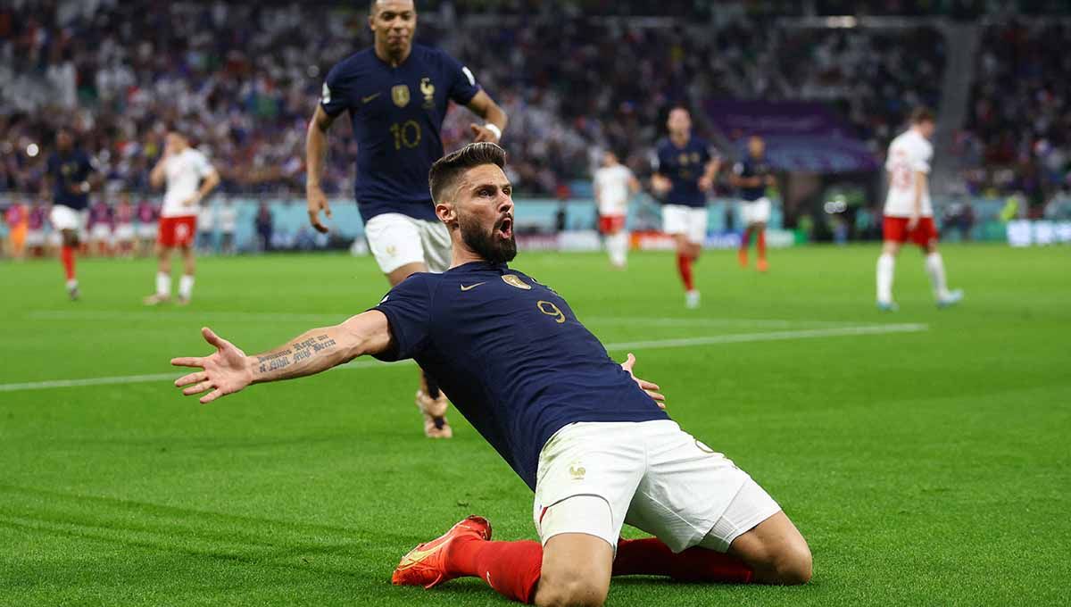 Olivier Giroud pemain Prancis merayakan gol pertamanya. (Foto: REUTERS/Hannah Mckay) Copyright: © REUTERS/Hannah Mckay