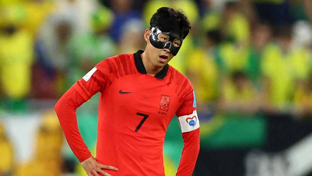 Reaksi Son Heung-min dari Korea Selatan. (Foto: REUTERS/Carl Recine) Copyright: © REUTERS/Carl Recine