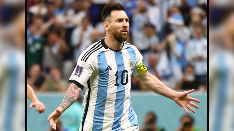 Selebrasi dari pemain megabintang sekaligus kapten Timnas Argentina, Lionel Messi usai jebol gawang Belanda di Perempatfinal Piala Dunia 2022 (Foto: REUTERS/Carl Recine). Copyright: © REUTERS/Carl Recine