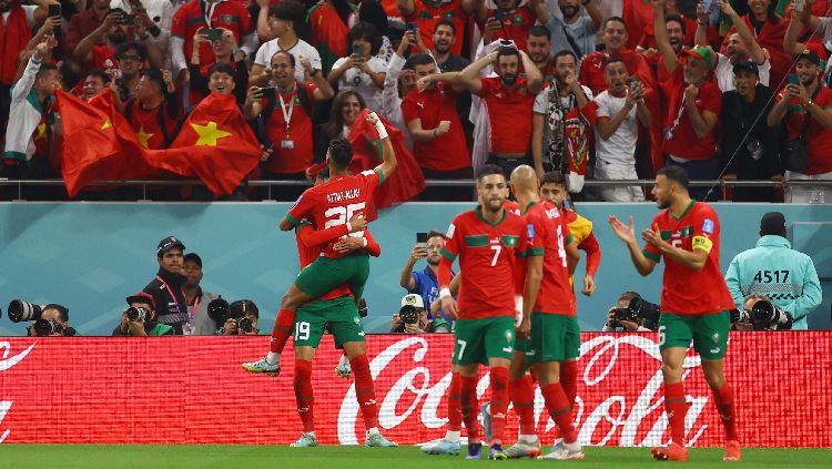 Youssef En-Nesyri dari Maroko merayakan gol pertama mereka kontra Portugal di Piala Dunia 2022 REUTERS-Kai Pfaffenbach Copyright: © REUTERS-Kai Pfaffenbach