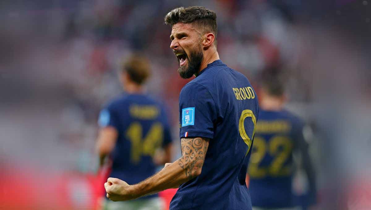 Olivier Giroud rayakan gol kedua Prancis kontra Inggris perempat final di Piala Dunia Qatar 2022. (Foto: REUTERS/Matthew Childs) Copyright: © REUTERS/Matthew Childs