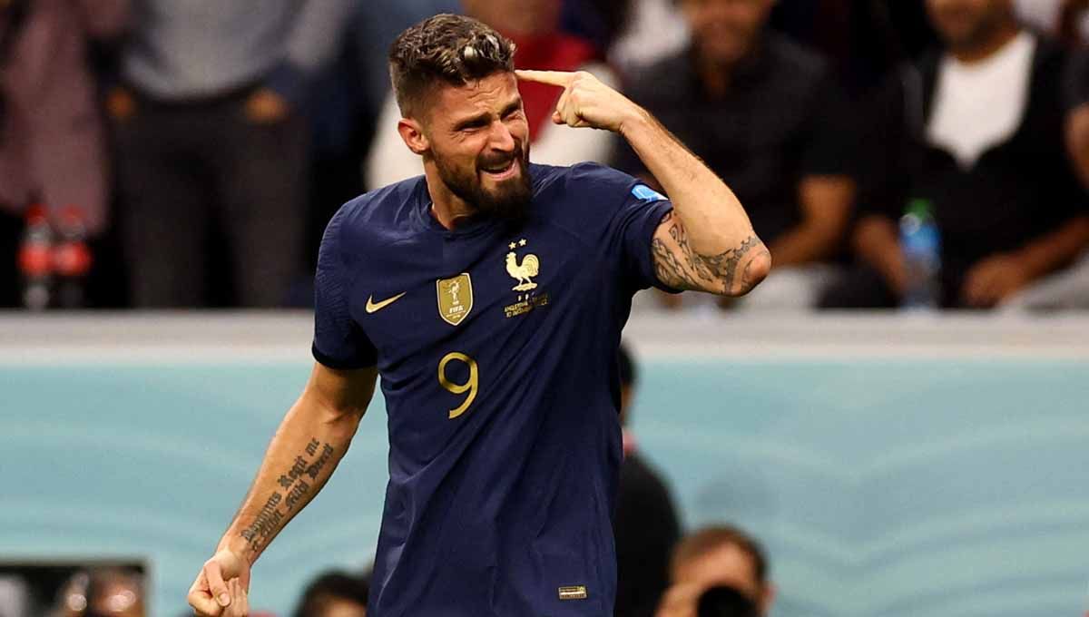 Olivier Giroud rayakan gol kedua Prancis kontra Inggris perempat final di Piala Dunia Qatar 2022. (Foto: REUTERS/Hannah Mckay) Copyright: © REUTERS/Hannah Mckay