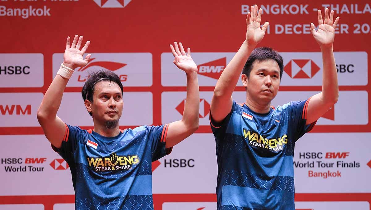 Mohammad Ahsan/Hendra Setiawan bikin Badminton Lovers (BL) auto bangga karena The Daddies mejeng di Times Square, New York, Amerika Serikat. (Foto: PBSI) Copyright: © PBSI