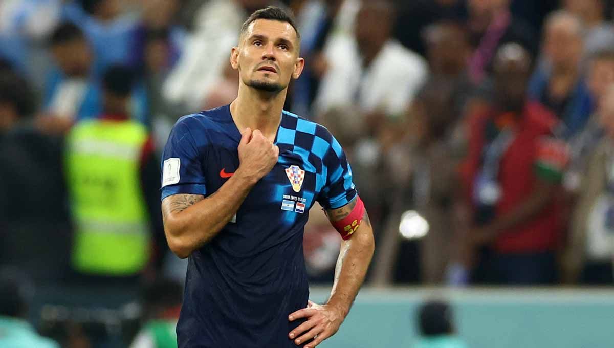 Dejan Lovren dari Kroasia terlihat sedih usai pertandingan saat Kroasia tersingkir dari Piala Dunia Qatar 2022. (Foto: REUTERS/Carl Recine) Copyright: © REUTERS/Carl Recine