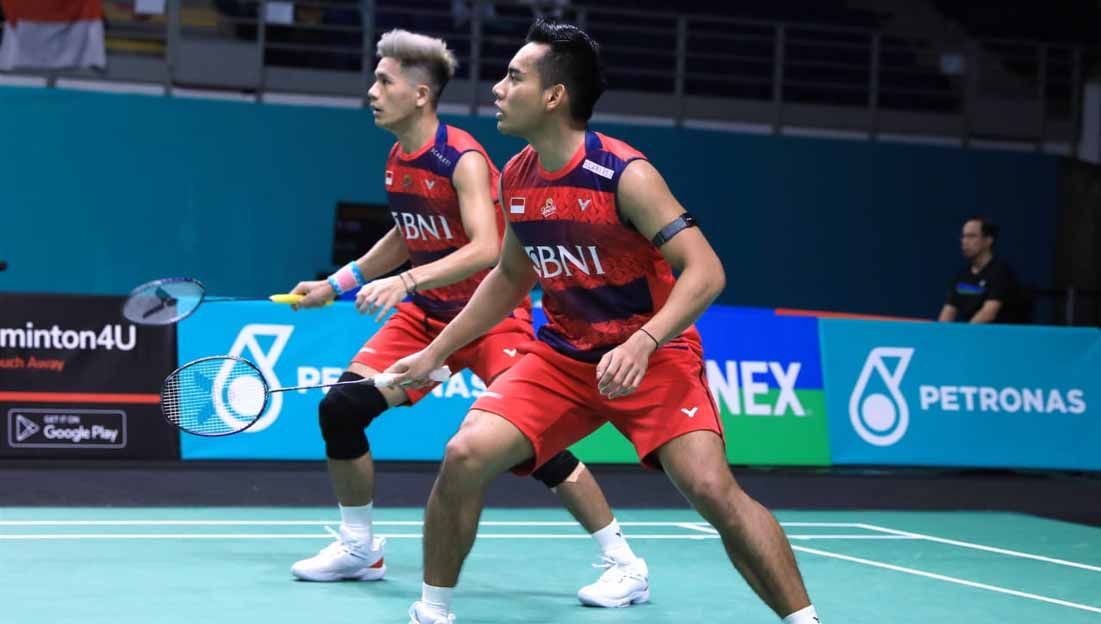 Pasangan ganda putra Indonesia, Pramudya Kusumawardana/Yeremia Rambitan di Malaysia Open 2023. Kini mereka melanjutkan perjuangan di Thailand Masters 2023. (Foto: PBSI) Copyright: © PBSI