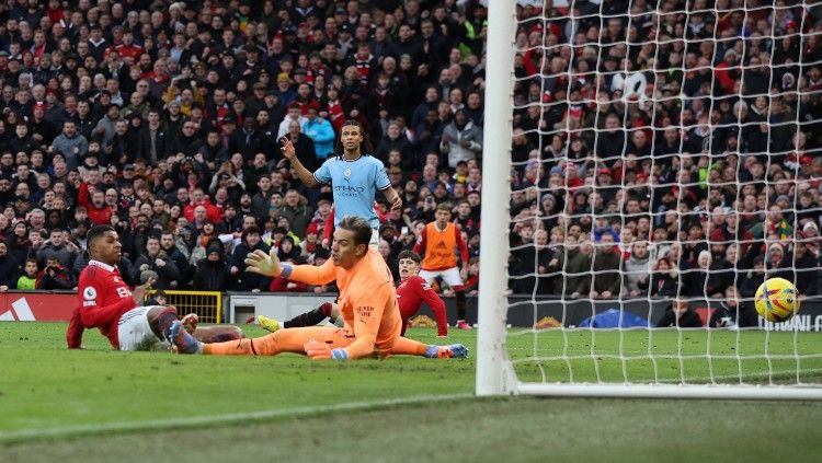 Marcus Rashford mencetakgol penentu kemenangan Manchester United atas Manchester City (14/01/23). (Foto: REUTERS/Phil Noble) Copyright: © REUTERS/Phil Noble