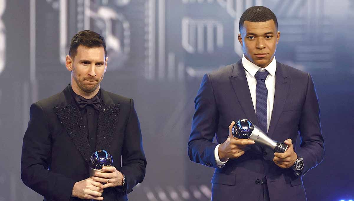 Lionel Messi dan Kylian Mbappe di acara The Best FIFA Football Awards 2022. Foto: REUTERS/Sarah Meyssonnier. Copyright: © REUTERS/Sarah Meyssonnier