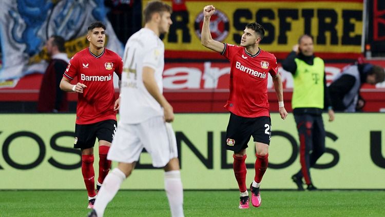 Exequiel Palacios merayakan golnya di laga Bayer Leverkusen vs Bayern Munchen (19/03/23). (Foto: REUTERS/Thilo Schmuelgen) Copyright: © REUTERS/Thilo Schmuelgen