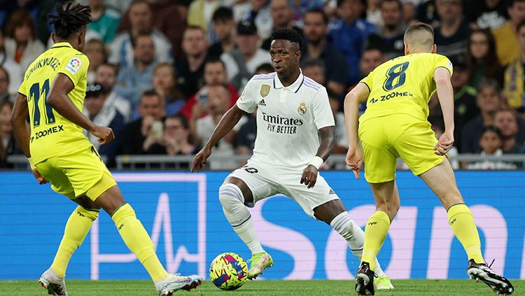 Vinicius Jr belum lama ini juga dikaitkan dengan Liverpool. Foto: REUTERS/Isabel Infantes. Copyright: © REUTERS/Isabel Infantes