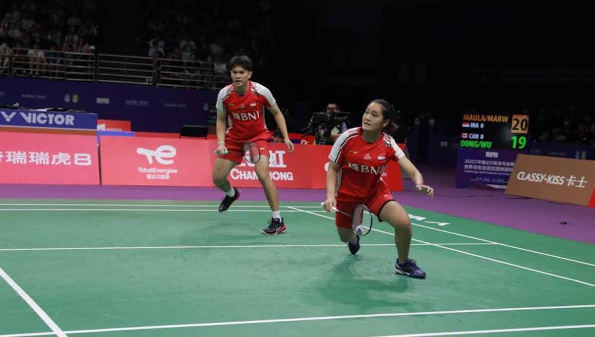 Pasangan ganda campuran Indonesia Adnan Maulana/Nita Violina di Sudirman Cup 2023. (Foto: PBSI) Copyright: © PBSI