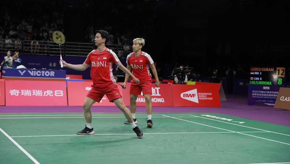 Kevin Sanjaya/Marcus Gideon masih kesulitan menembus posisi top 10 di ranking BWF usai kalah di semifinal Thailand Open 2023. (Foto: PBSI) Copyright: © PBSI