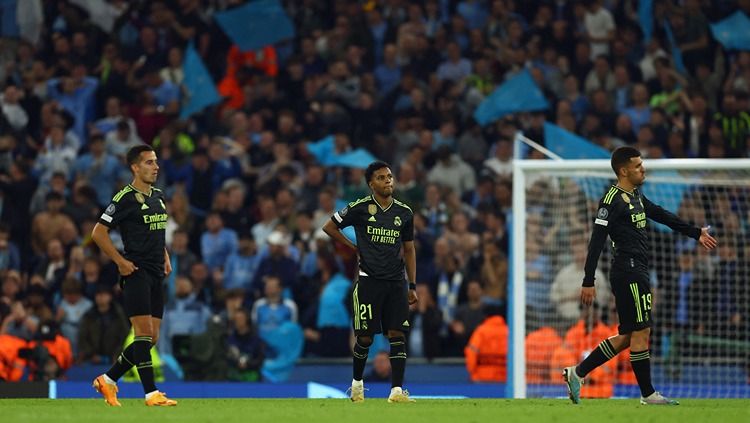 Ekspresi kecewa Lucas Vasquez, Rodrygo Goes, dan Dani Ceballos pasca laga Manchester City vs Real Madrid (18/05/23). (Foto: REUTERS/Molly Darlington) Copyright: © REUTERS/Molly Darlington