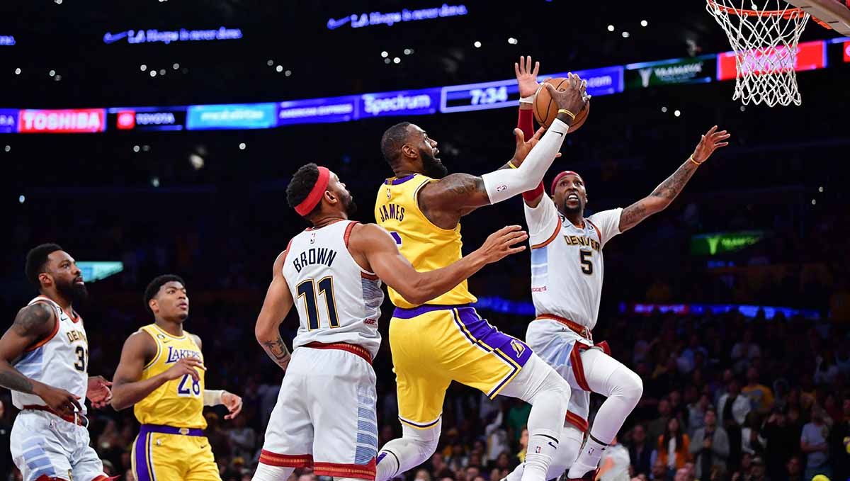Pertandingan NBA antara Los Angeles Lakers vs Denver Nuggets. (Foto: REUTERS/Gary A. Vasquez) Copyright: © REUTERS/Gary A. Vasquez