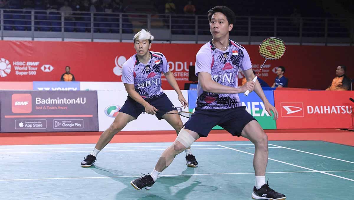 Ganda putra, Kevin Sanjaya/Marcus Gideon, tampak dibuat geram oleh borok panitia penyelenggara Thailand Open 2023. Copyright: © PBSI