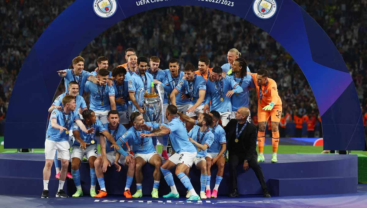 Pemain Manchester City menjuarai Liga Champions usai mengalahkan Inter Milan di final. (Foto: REUTERS/Molly Darlington) Copyright: © REUTERS/Molly Darlington