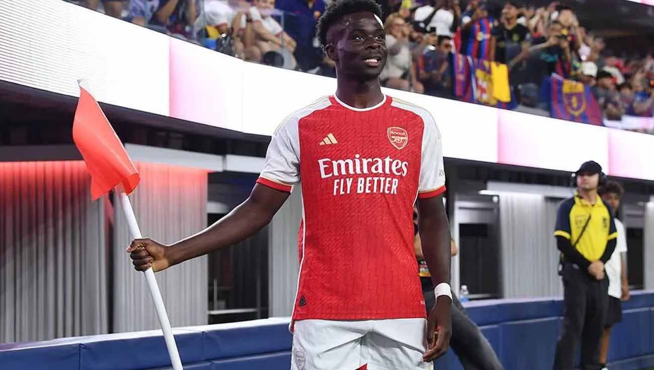 Selebrasi pemain Arsenal, Bukayo Saka usai mencetak gol ke gawang Barcelona menit ke 13' di laga pramusim. (Foto: arsenal) Copyright: © arsenal