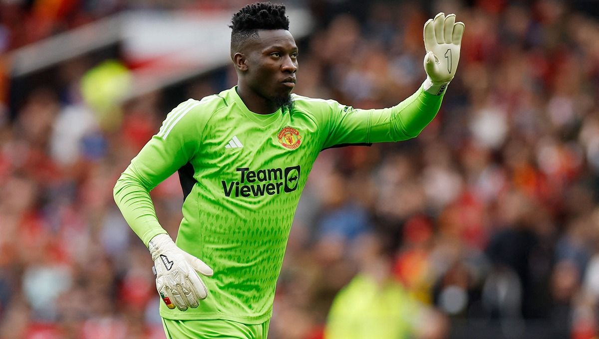 Andre Onana dikabarkan tidak jadi mundur dari timnas. Foto: Reuters/Jason Cairnduff. Copyright: © Reuters/Jason Cairnduff