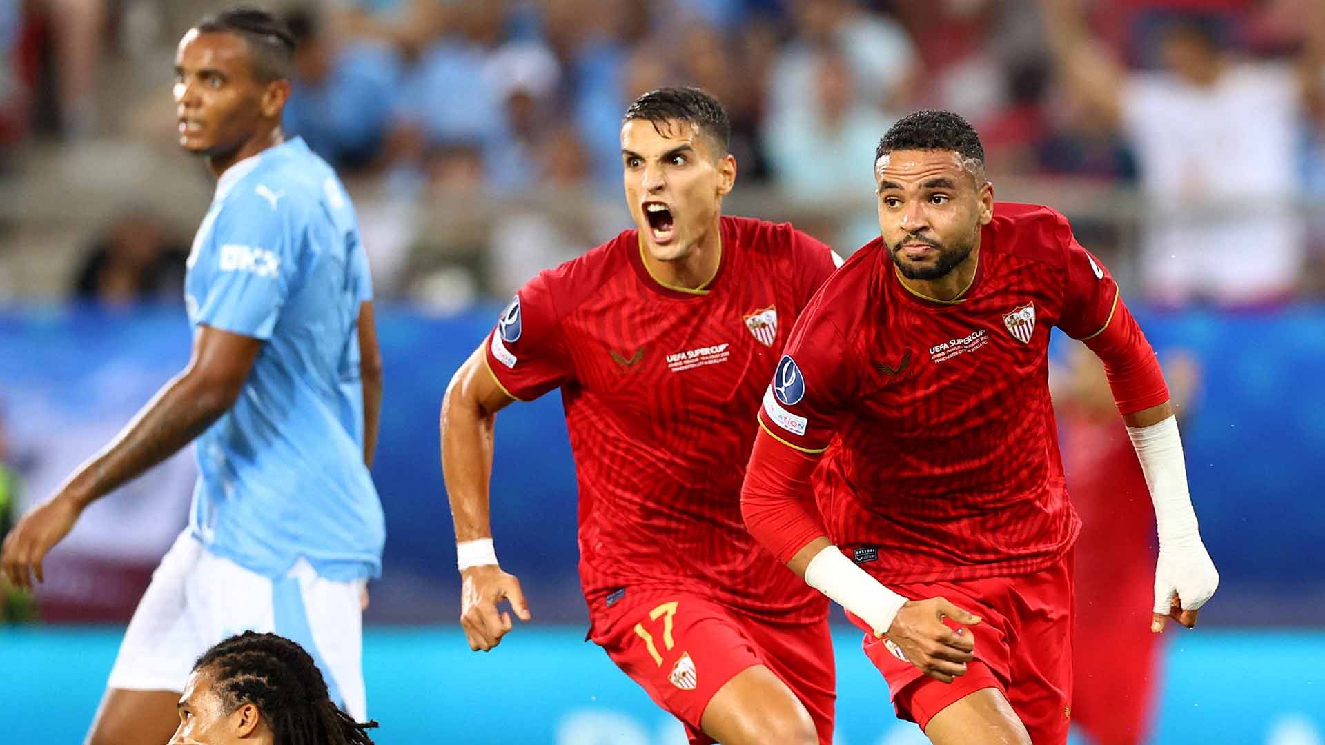 Selebrasi pemain Sevilla, Youssef En-Nesyri merayakan gol pertama usai mencetak gol ke gawang Manchester City pada laga Piala Super UEFA 2023. (Foto: REUTERS/Stoyan Nenov) Copyright: © REUTERS/Stoyan Nenov