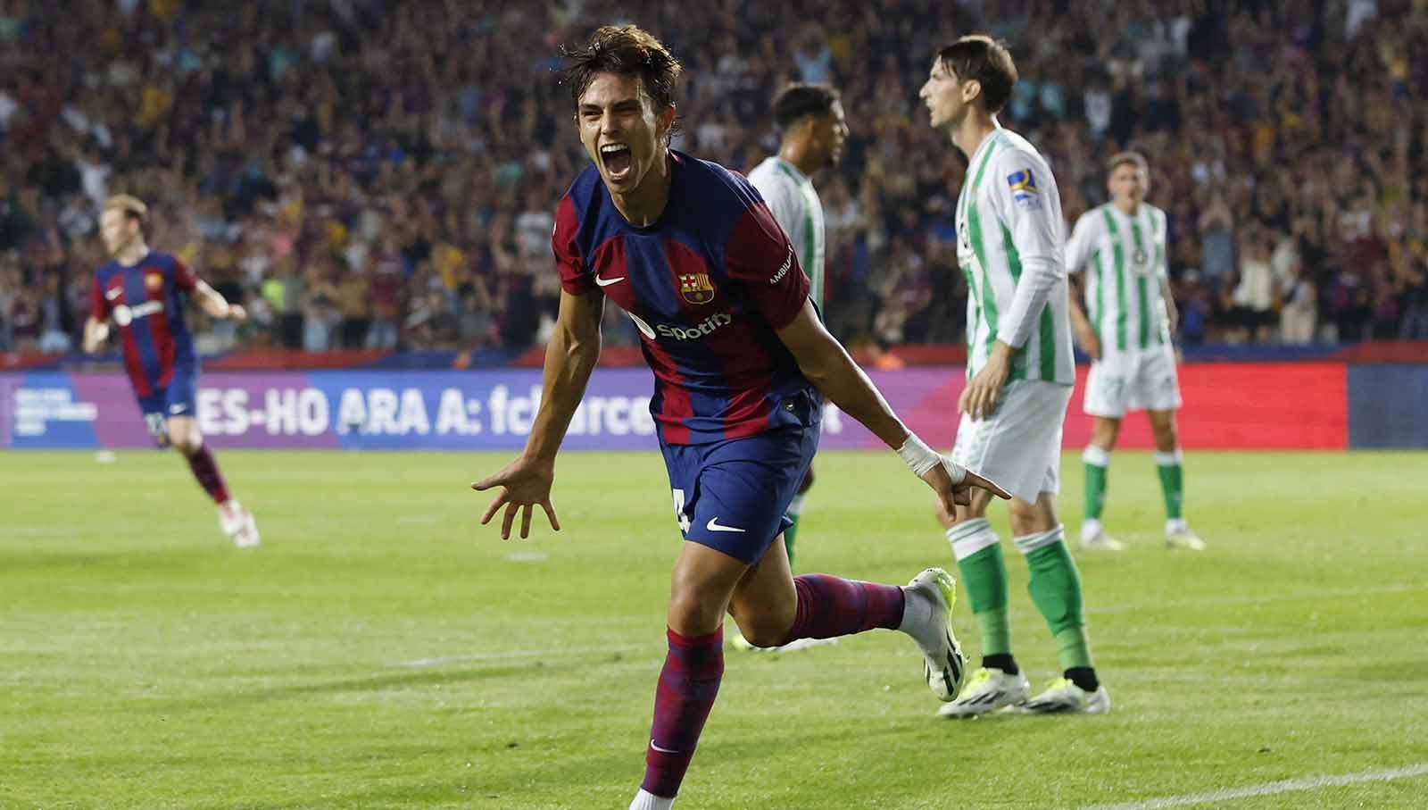 Selebrasi pemain Barcelona Joao Felix usai mencetak gol di laga Barcelona vs Real Betis (17/09/23). (Foto: REUTERS/Albert Gea) Copyright: © REUTERS/Albert Gea