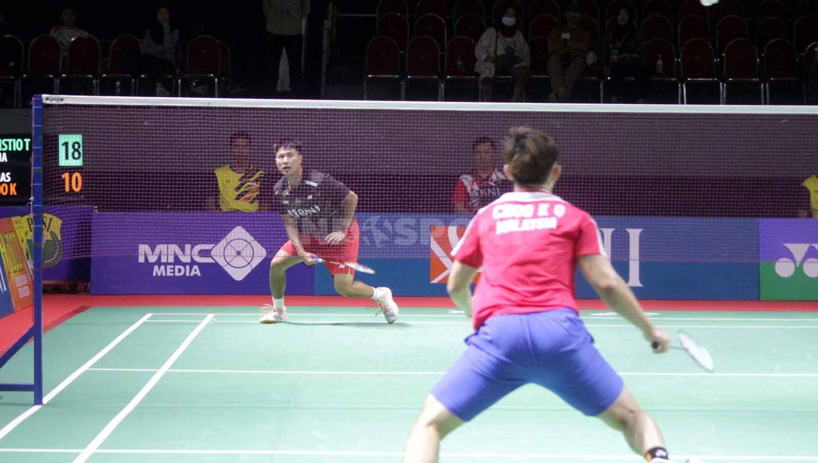 Tegar Sulistio menang dua set mengalahkan Choo Kai Qing dari malaysia di hari pertama IIC Surabaya. (Foto: Fitra Herdian/INDOSPORT) Copyright: © Fitra Herdian/INDOSPORT