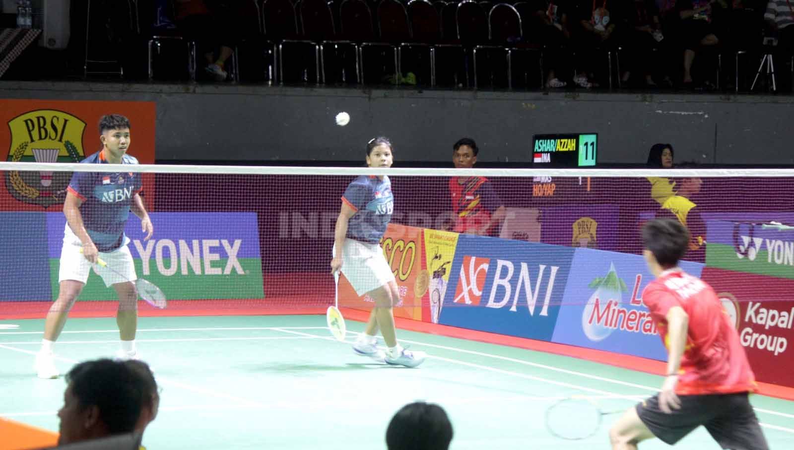 Pasangan ganda campuran Indonesia Zaidan/Felisha menang 3-0 melawan pasangan Thailand Neuaduang Mangkornloi/Atitaya Povanon di babak 32 besar Xpora IIC Surabaya 2023. (Foto: Fitra Herdian/INDOSPORT) Copyright: © Fitra Herdian/INDOSPORT