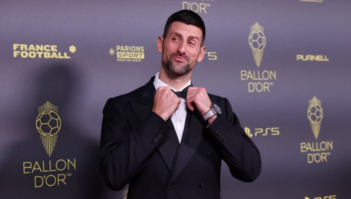 Hadiri penghargaan Ballon d'Or 2023 di Paris, Selasa (31/10/23) dini hari WIB, petenis nomor satu dunia, Novak Djokovic mengaku sebagai pemain AC Milan. Foto: REUTERS/Stephanie Lecocq. Copyright: © REUTERS/Stephanie Lecocq