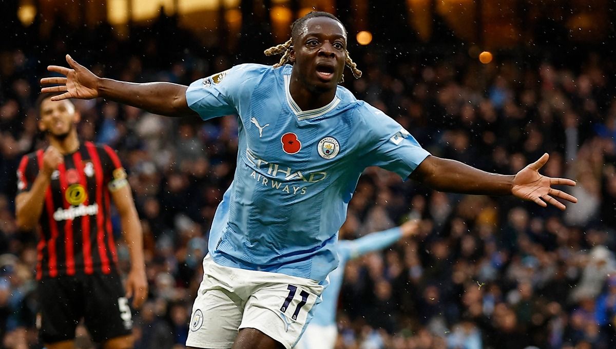 Jeremy Doku merayakan gol di laga Manchester City vs Bournemouth. (Foto: Reuters/Jason Cairnduff) Copyright: © Reuters/Jason Cairnduff